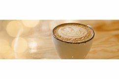 Mug of hot cappuccino on a wooden table in a cafe Product Image 1