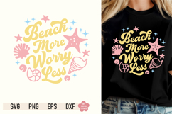 Model wearing a black t-shirt printed with a retro pastel graphic reading "Beach More Worry Less" decorated with seashells and starfishes.