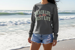 Retro beach typography design reading “Beach Life is the Best Life” in mint green collegiate lettering with coral script overlay, styled on a clean white background for a summer t-shirt graphic or Cricut project.