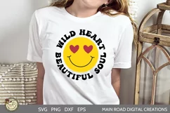 smiley face svg cut file being used on a woman wearing a white shirt