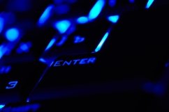 Enter key in a blue light. Macro shot. Product Image 1