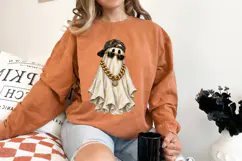Fun ghost graphic featuring thick painted texture and playful accessories including a sideways cap, black shades and oversized gold necklace.