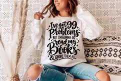 This book lover SVG features a tall, stacked composition with oversized cursive words, bold black lettering, decorative swashes, and small sparkling accents.