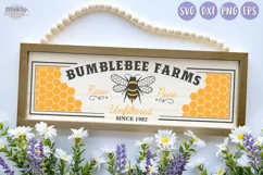 Bumblebee Farm with a honeybee and yellow honeycomb on a horizontal sign with lilac spring flowers 