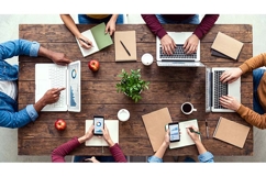 Top View of Creative Team Brainstorming in Office Workspace Product Image 1