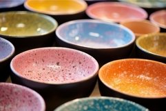Handcrafted Ceramic bowl with colorful powder. Generate Ai Product Image 1