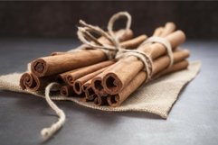 Cinnamon sticks handmade on textile sack in kitchen. Generat Product Image 1