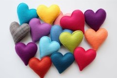 Whimsical Colorful woolen hearts. Heart craft on table Product Image 1