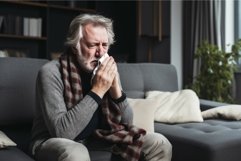 Coughing senior man with beard sitting on sofa. Generate Ai Product Image 1