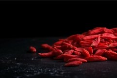 Goji berries on black background Product Image 1