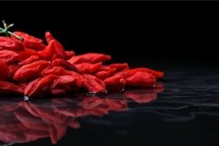 Goji berries on black background Product Image 1