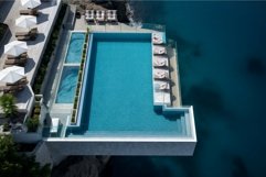 Breathtaking Hotel infinity pool view. Generate Ai Product Image 1