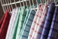 Closeup up photo of hanging kitchen towels. Generate ai Product Image 1