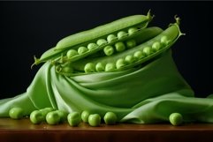 Fresh green peas pod burst open on silk Product Image 1
