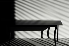 Monochrome silhouette of bench with shadow patterns Product Image 1