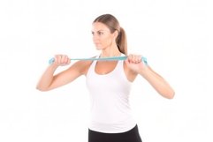 Woman elastic resistance band on white background. Generate Product Image 1