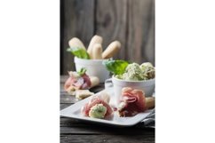 Italian crostini with cream cheese and prosciutto Product Image 1
