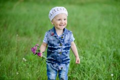 Cute baby girl on a walk in the Park Product Image 1