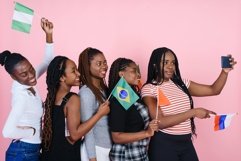 International female students take a selfie with the flags Product Image 1