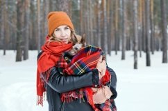 Beautiful woman is holding in hands her little dog. Product Image 1
