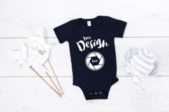 Black Bella Canvas 100B MockUp One Piece Flat Lay Bodysu Product Image 1