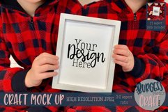 Boys plaid pyjamas holding small white sign IICraft mock up Product Image 1