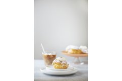 Dessert custard cakes with cream and powdered sugar Product Image 1
