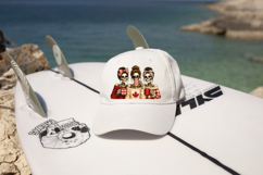 Canadian skeleton friends gather for coffee in a playful design featuring red plaid accessories, messy buns, sunglasses and a bold maple leaf sweater.