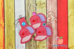 Fashionable Cap ITH Key Fob Pattern Product Image 1