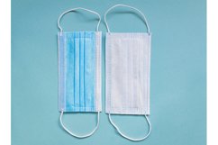 Two sides of medical mask on blue background Product Image 1