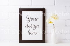 Black brown  frame mockup with soft yellow orchid in vase Product Image 1