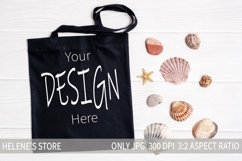 Black canvas tote bag beach mockup