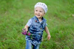 Cute baby girl on a walk in the Park Product Image 1