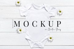 Daisy Flatlay Baby Bodysuit Mockup - Spring Mockup Product Image 1