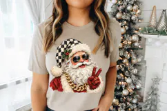 Painted Santa PNG with a playful modern look, featuring a checkerboard Christmas hat, holly berries, black aviators, red gloves and a chunky gold chain.