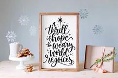 This holiday cut file combines expressive black script typography, a prominent Christmas star, and smaller sparkling accents around the meaningful lyrics from O Holy Night.