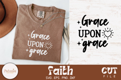 Folded t-shirt mockup with “Grace Upon Grace” SVG design featuring heart and sparkle elements