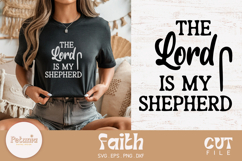 Woman wearing t-shirt with “The Lord is My Shepherd” SVG Christian quote design.