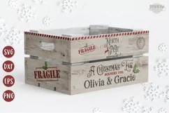 Christmas Eve wooden crate shown personalized with official north pole stamps