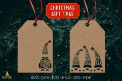 Christmas gnomes svg design being used as a Christmas gift tag. 