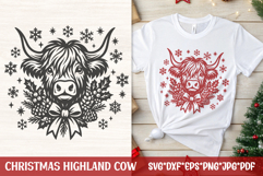 Rustic Christmas Highland cow head with snowflakes, holly, berries and bow—single-color SVG design for Cricut holiday shirts and farmhouse décor.