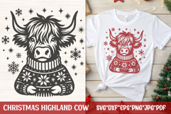 Festive Highland cow wearing a snowflake sweater with snowflakes around—Christmas SVG for shirts, mugs and rustic winter décor.