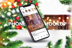 Christmas iPhone 13 mockup on Marble table with Christmas tree and decorations