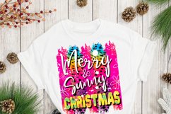 bright and colorful Christmas png design on a colorful leopard pattern background with a phrase saying merry and sunny Christmas on a white T-shirt