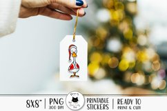 christmas sticker with a duck wearing a santa hat shown on a tag