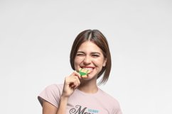 christmas-t-shirt-mockup-of-smiling-woman-in-studio-with christmas sublimation colorful print design