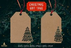 Christmas tree gift tags pupercut svg design being used as a Christmas gift tag.
