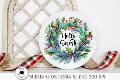 watercolor christmas wreath with holly saying welcome guests shown on a sign