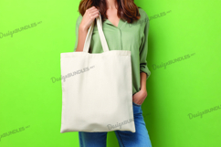Woman holding tote bag mockup Product Image 1