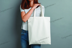 Woman holding tote bag mockup Product Image 1